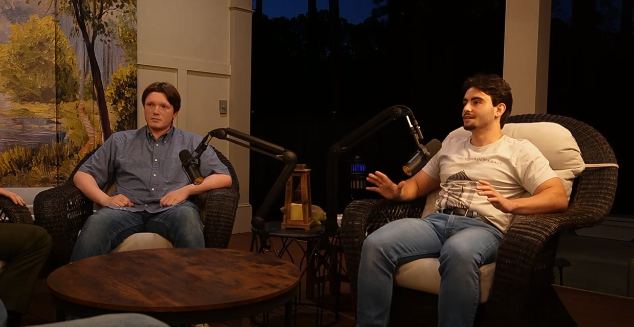 ThreeFlowing podcast hosts recording an episode in the evening